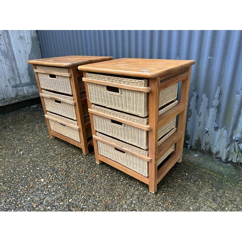 24 - A pair of pine chests of three with basket drawers