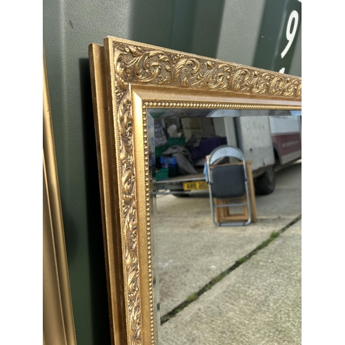 264 - A large ornate gold gilt overmantle mirror 88x107 together with another gold framed mirror