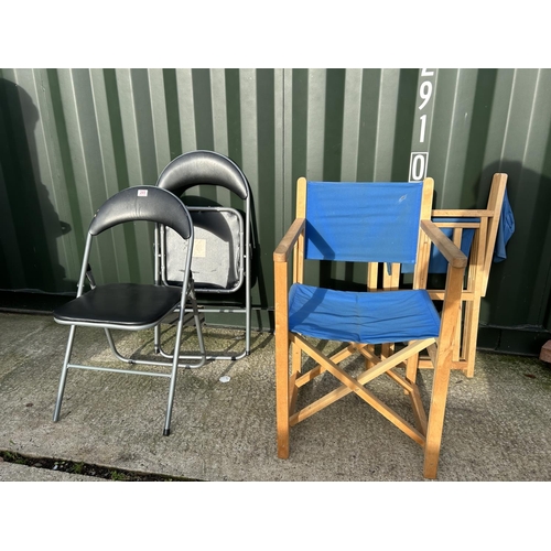 265 - Two modern metal folding chairs together with two wooden directors style folding chairs