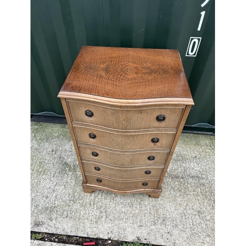 286 - A reproduction serpentine tallboy chest of five drawers 54X44X95