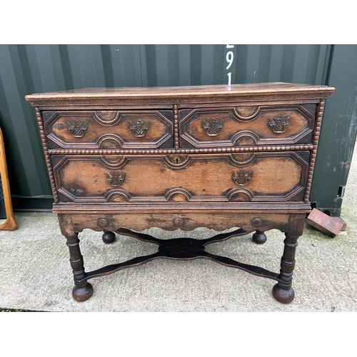 288 - A large antique oak chest of three drawers with cross stretcher base 110x56x100