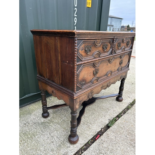 288 - A large antique oak chest of three drawers with cross stretcher base 110x56x100