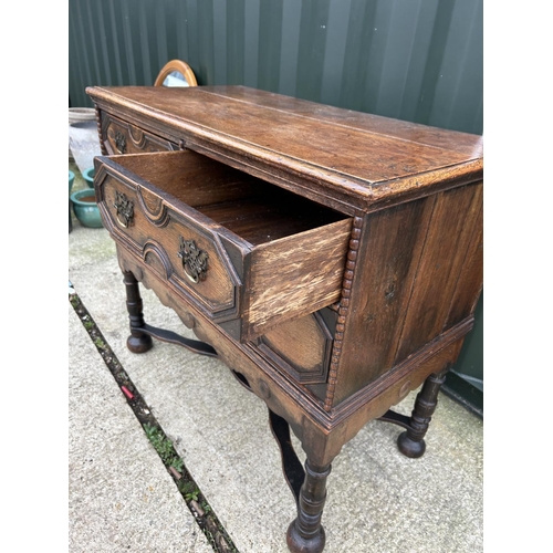 288 - A large antique oak chest of three drawers with cross stretcher base 110x56x100