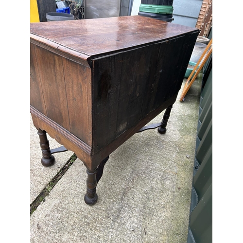 288 - A large antique oak chest of three drawers with cross stretcher base 110x56x100