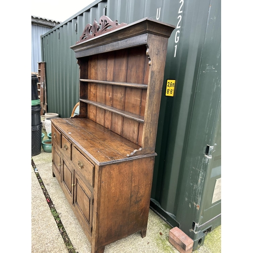 290 - An antique oak three drawer and three door dresser with removable platerack top 163x45x181