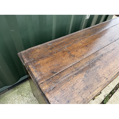 290 - An antique oak three drawer and three door dresser with removable platerack top 163x45x181