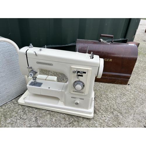 299 - A cased singer sewing machine and a Frister & Rossman sewing machine