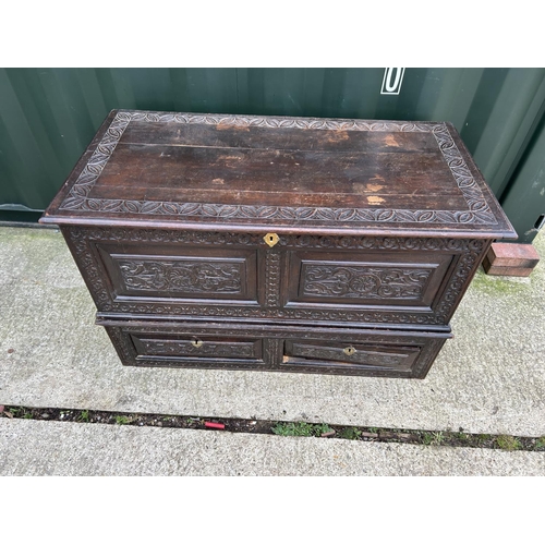 300 - An antique carved oak two section Mule Chest 125x62x77