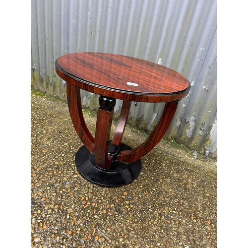 318 - An art deco stlye circular occasional table 53cm