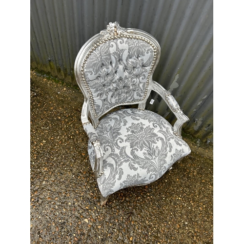 319 - A silver gilt and silver pattern upholstery throne chair