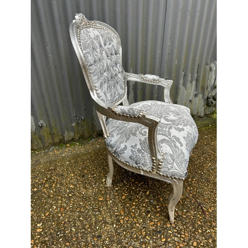 319 - A silver gilt and silver pattern upholstery throne chair