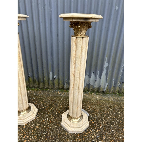 322 - A pair of white marble column plant stands 100cm tall