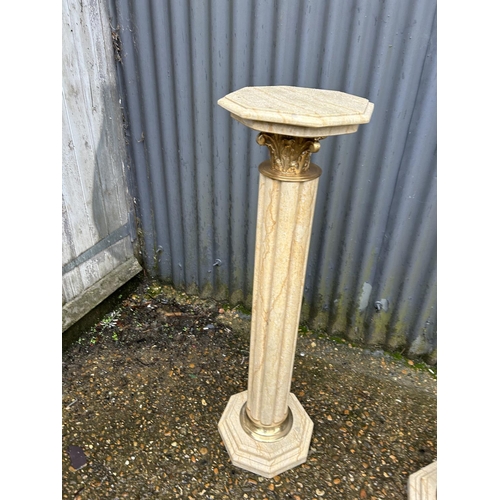 322 - A pair of white marble column plant stands 100cm tall