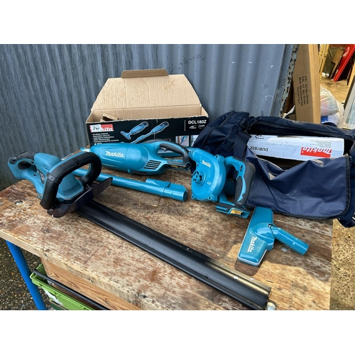 341 - A Makita cordless hedge cutter together with vac and blower (lacking batteries)