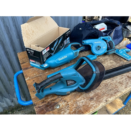 341 - A Makita cordless hedge cutter together with vac and blower (lacking batteries)