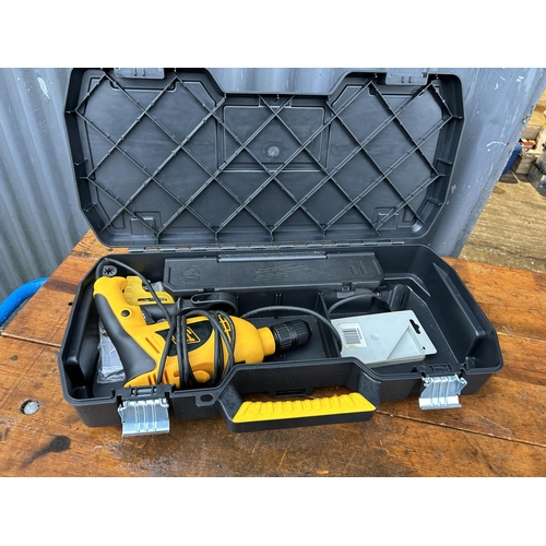 344 - A cased JCB hammer drill