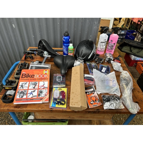 349 - A collection of cycling items including helmet, cleaners, pedals, lights etc