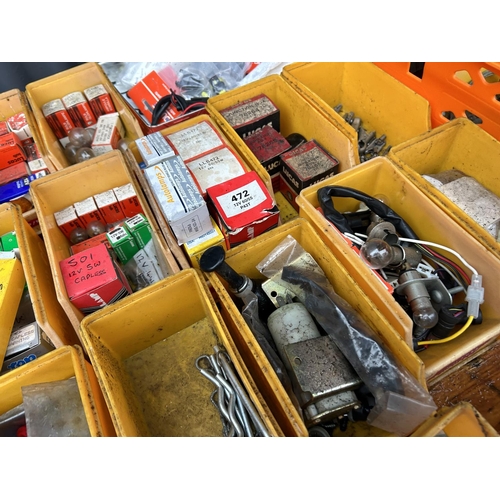 350 - Two crates containing parts, tubs of vintage car parts including dials, lucas bulbs, clips etc