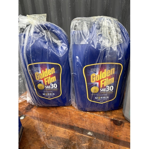 352 - Two new bottles of SAE 30 classic car oil together with a collection of other motoring fluids and wa... 