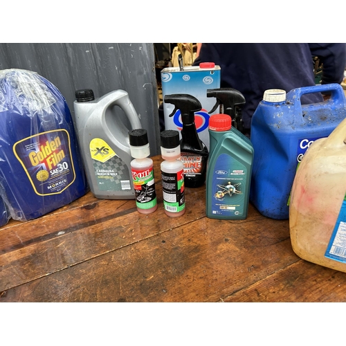 352 - Two new bottles of SAE 30 classic car oil together with a collection of other motoring fluids and wa... 