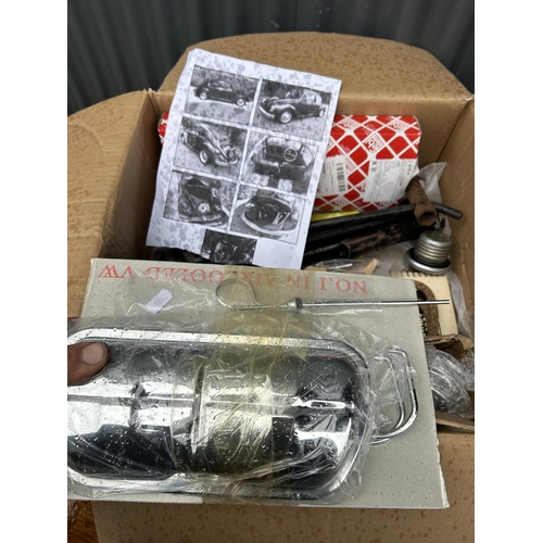 360 - A box of VW beetle chrome parts together with Kawasaki bike filters and spark plugs