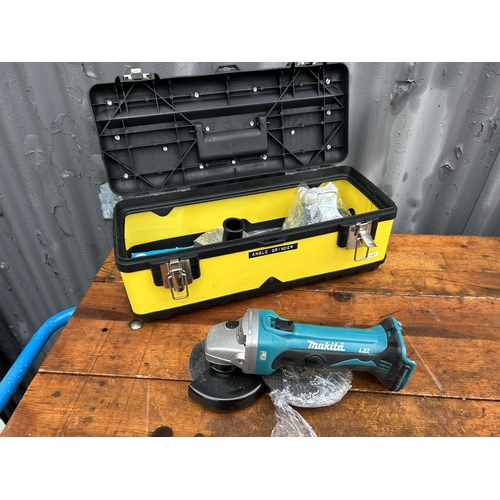 376 - A Stanley hard tool box containing Makita Cordless angle grinder Model DGA45Z ( No batteries)