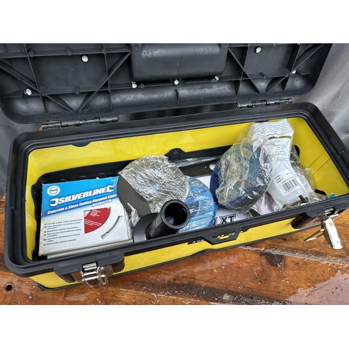 376 - A Stanley hard tool box containing Makita Cordless angle grinder Model DGA45Z ( No batteries)