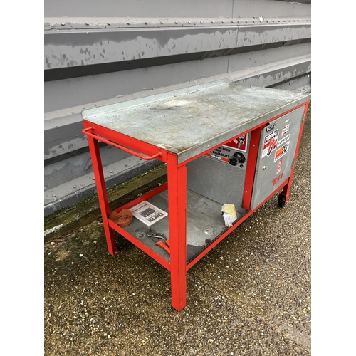 378 - A large metal trolley workbench with single door cupboard