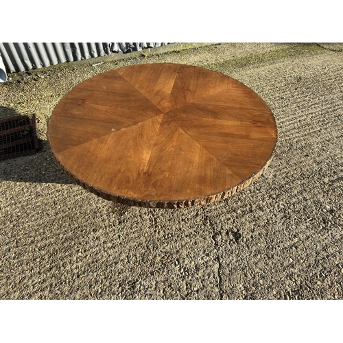 4 - A log effect circular coffee table