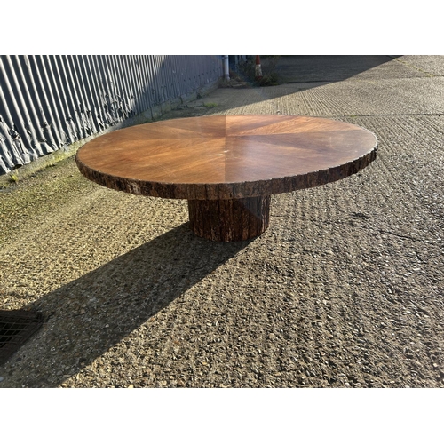 4 - A log effect circular coffee table