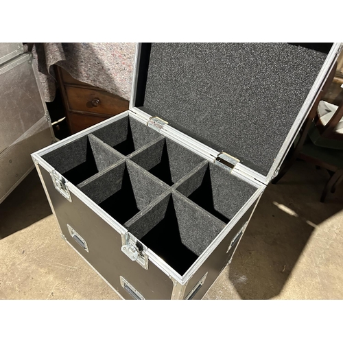 43 - A black trolley flight case with 6 compartments 86x56x90