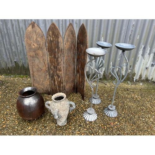 71 - A wooden four section screen, three candle stands and two vases
