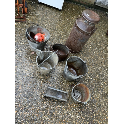 72 - A vintage churn, four galvanised buckets, cauldron and feeder