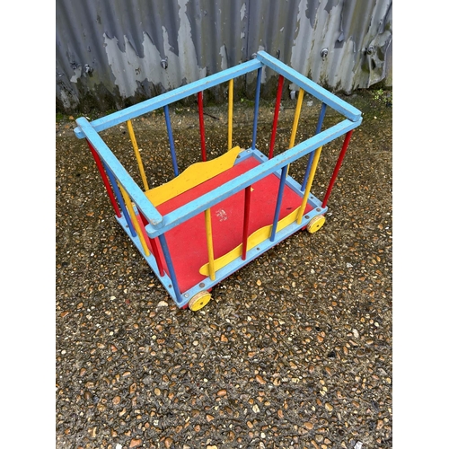 76 - A vintage childrens toy trolley