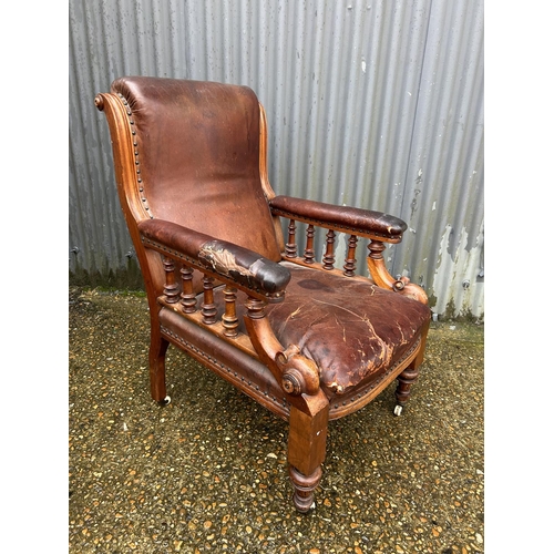 80 - A Victorian mahogany framed library chair with leather upholstery (AF)