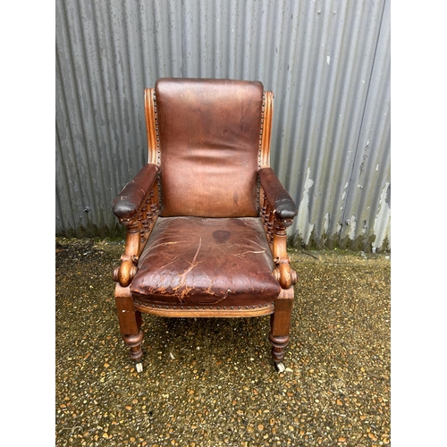 80 - A Victorian mahogany framed library chair with leather upholstery (AF)