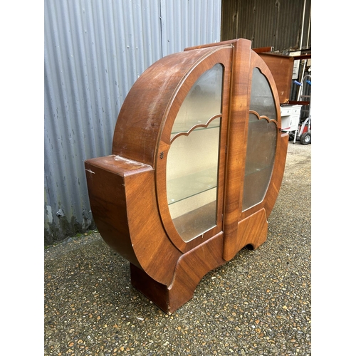 82 - An art deco walnut wheel cabinet for restoration