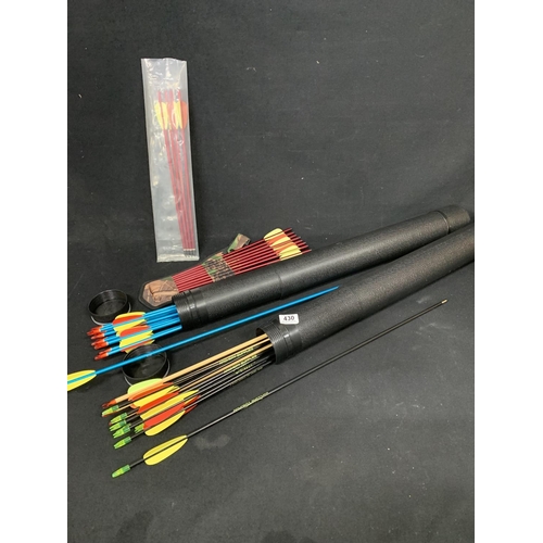 430 - Two tubes of Archery arrows length 78 cms  and others