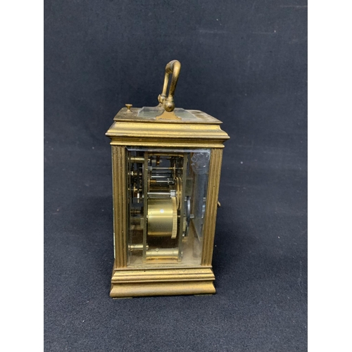 459 - Antique brass carriage clock with striking repeater movement, runs, chip to one side glass, height o... 