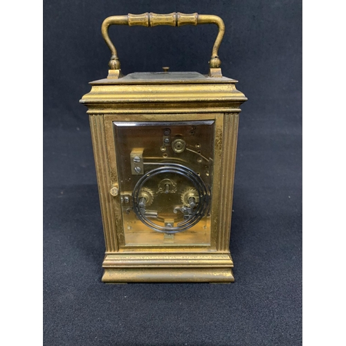 459 - Antique brass carriage clock with striking repeater movement, runs, chip to one side glass, height o... 