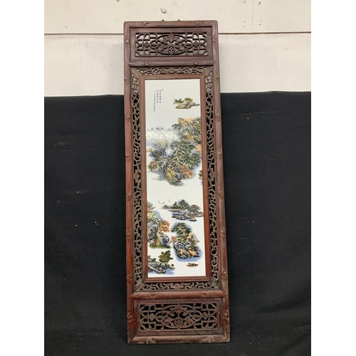 481 - Carved wooden porcelain island scenes panel, oriental wall hanging, overall 36 x 120cms