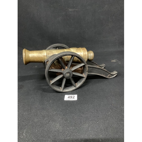 492 - Brass and Iron Cannon, overall length 33cms