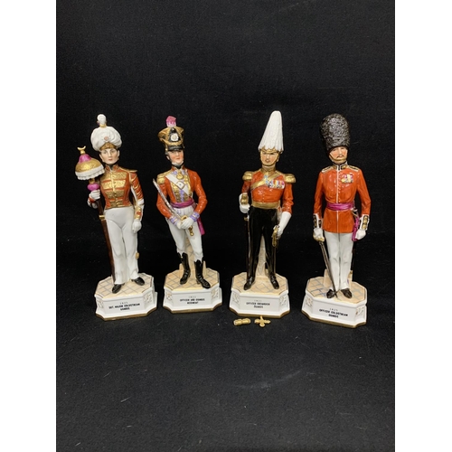 517 - Four Porcelain Soldier Figures height 31 cms, one a/f