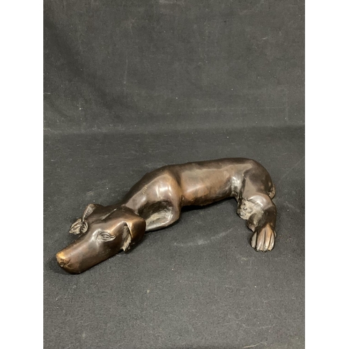 535 - Bronze sleeping dog figure, length 36cms