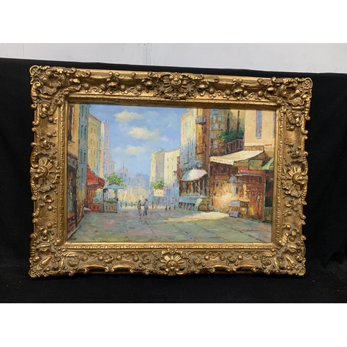 548 - Large heavy gilt framed giclee painting of street scene overall 116 x 87 cms