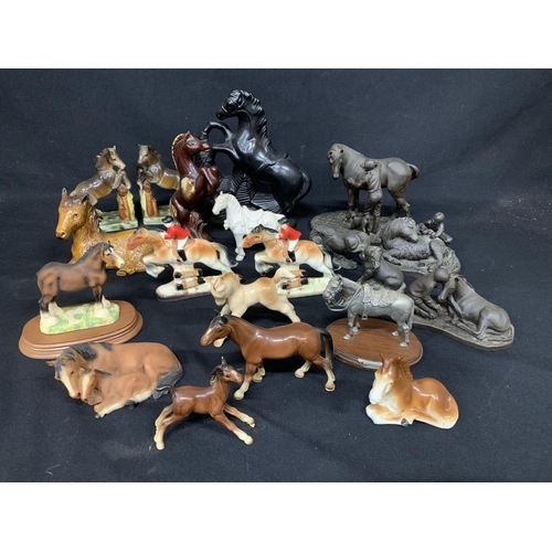 562 - Collection of horse figures