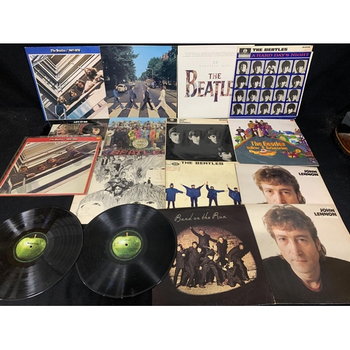 574 - 12 Beatles LP's, 2 John Lennon, Band on the Run plus Abbey Road and McCartney LP's without Covers