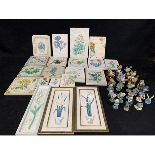 615 - Hand painted wall plaques and collection of small bird figures