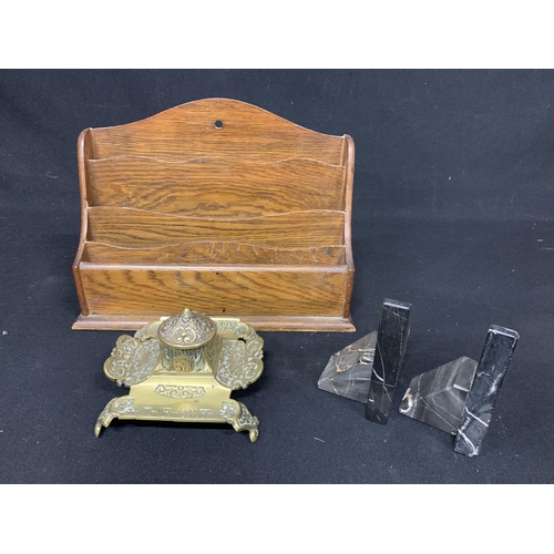 628 - Brass inkwell with liner, wooden stationery rack and bookends