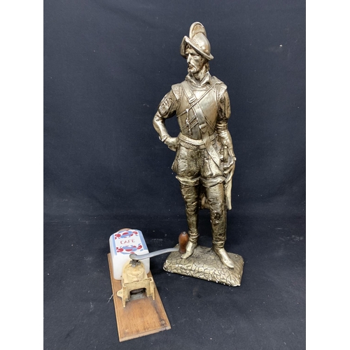 670 - Plaster Figure a/f, height 65cms and coffee grinder